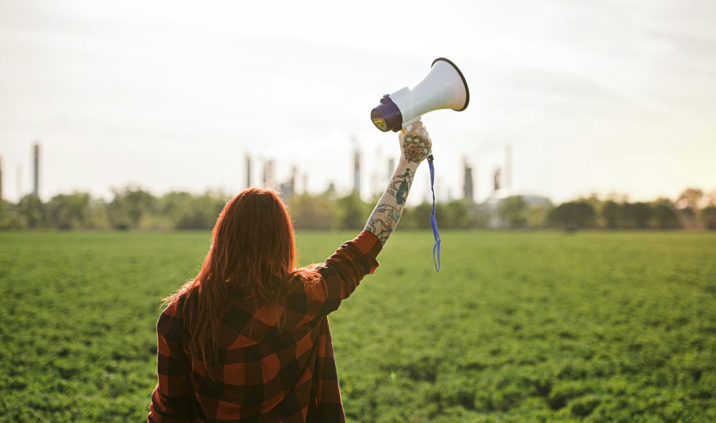 Woman with bullhorn