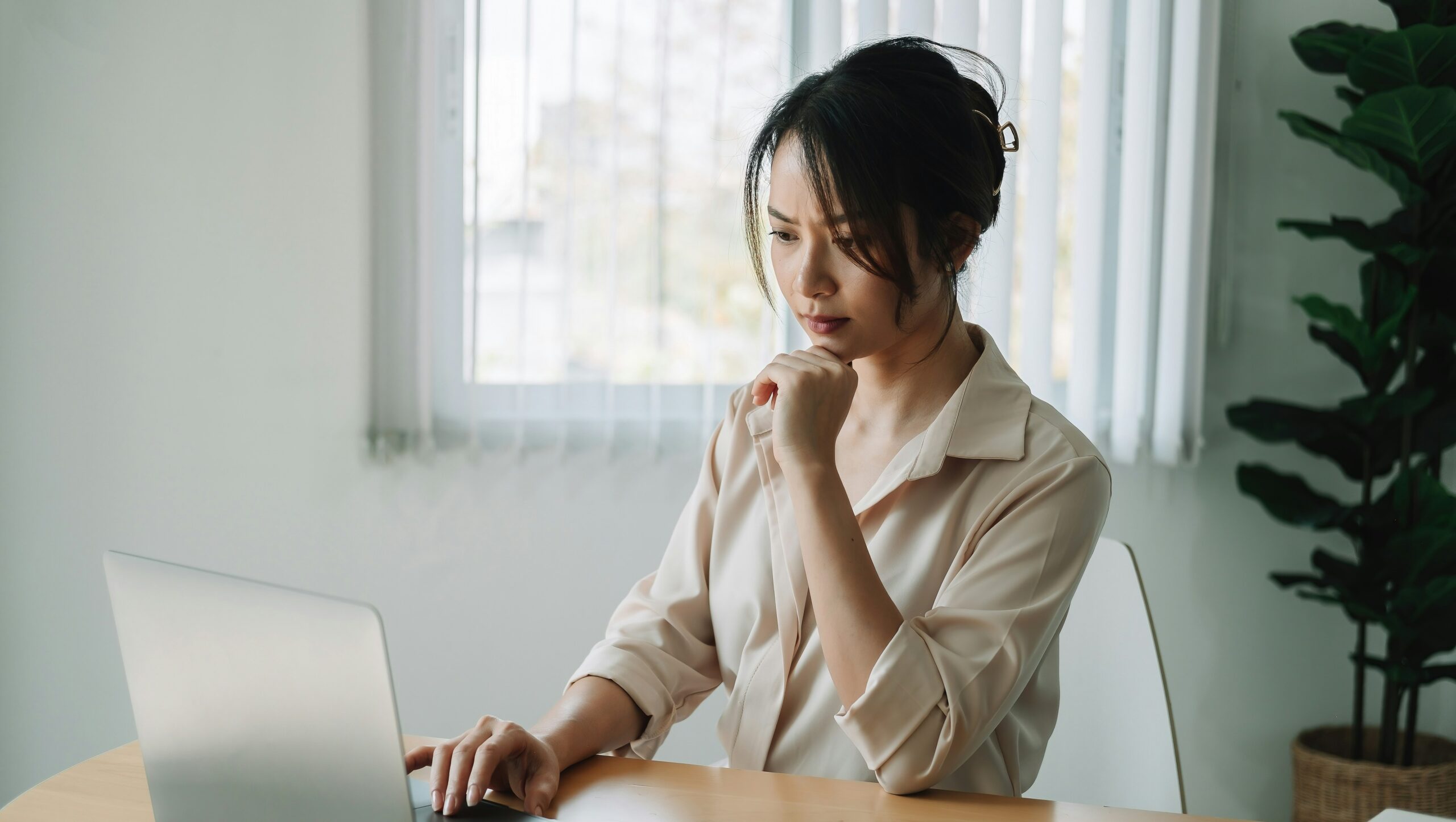 Woman taking online screening tool